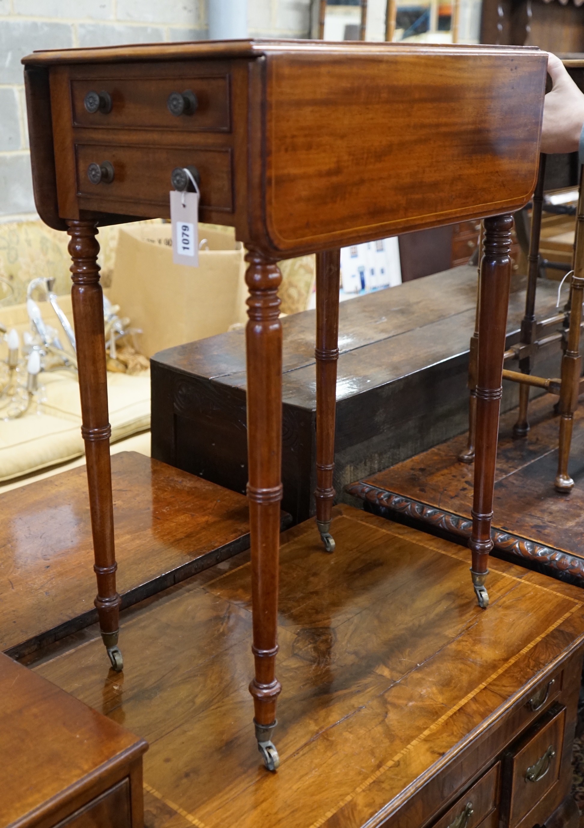 A Regency mahogany drop flap work table, width 52cm, depth 34cm, height 75cm